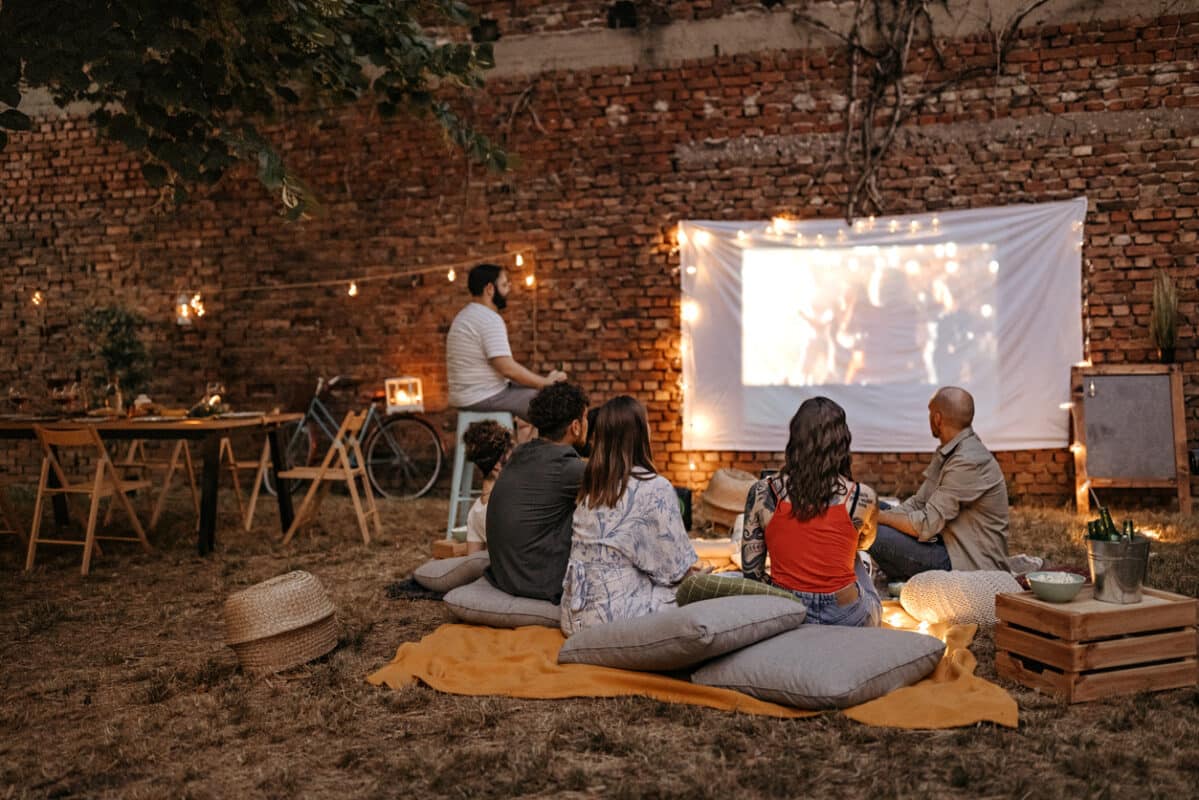 Photo of friends at backyard movie night.