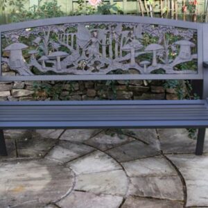 Steel framed cast iron bench with fairies