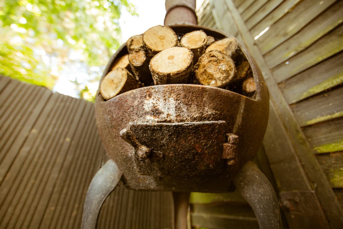 logs crammed into chimenea